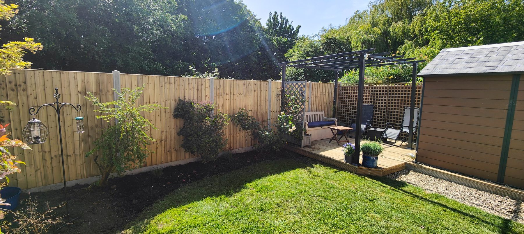 Garden fencing by pergola